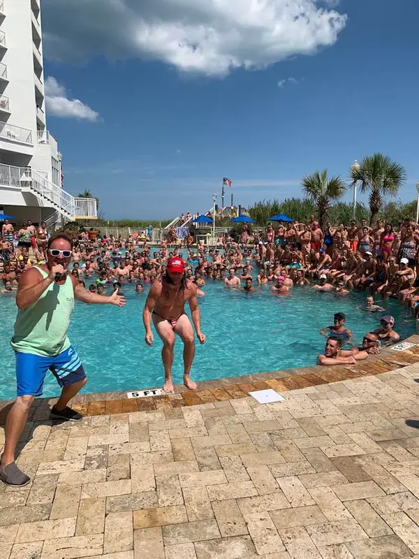 Belly-flop contest at a Seawatch Resort pool party