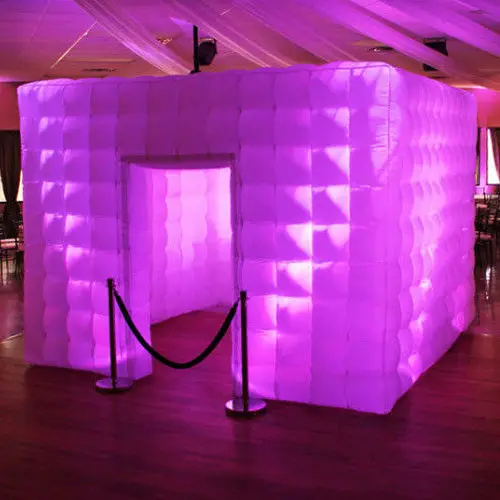 Enclosed inflatable photo booth glowing pink