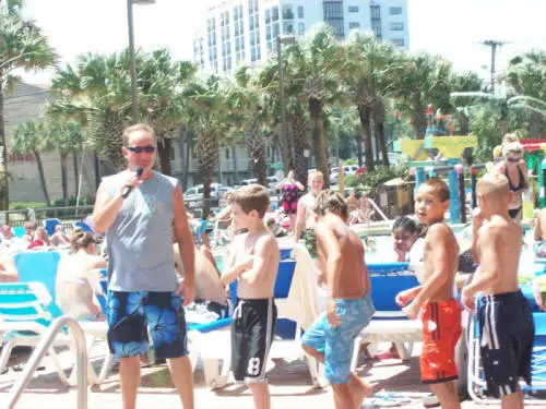Chris James leading a poolside contest