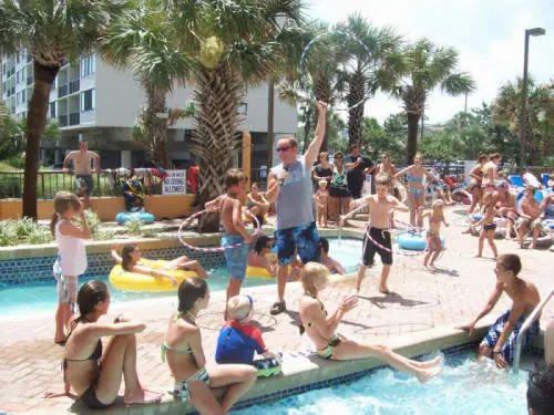 Guests playing a poolside game