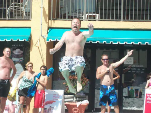A belly-flop contestant mid-leap